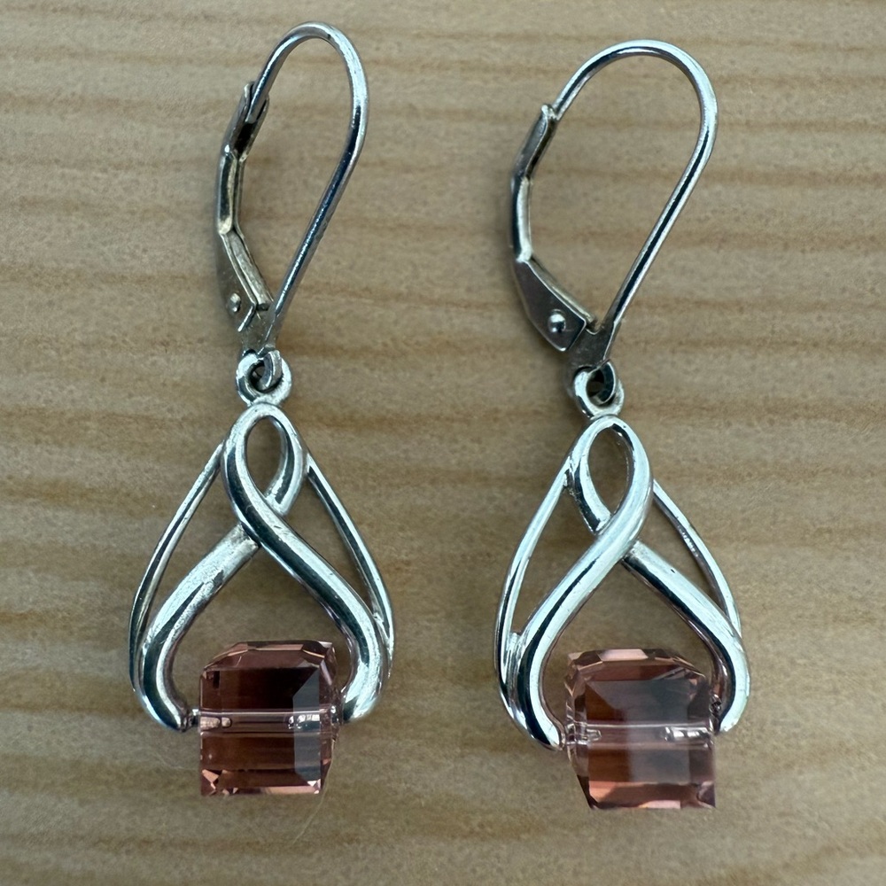 Elegant Silver Celtic Knot Drop Earrings With Pink Crystal Cube